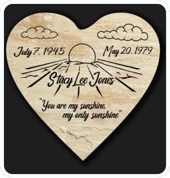 Heart-shaped memorial plaque with sunrise engraving