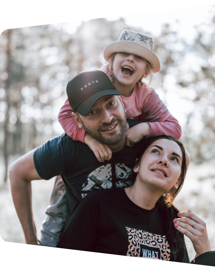 Family enjoying a sunny day outdoors together.