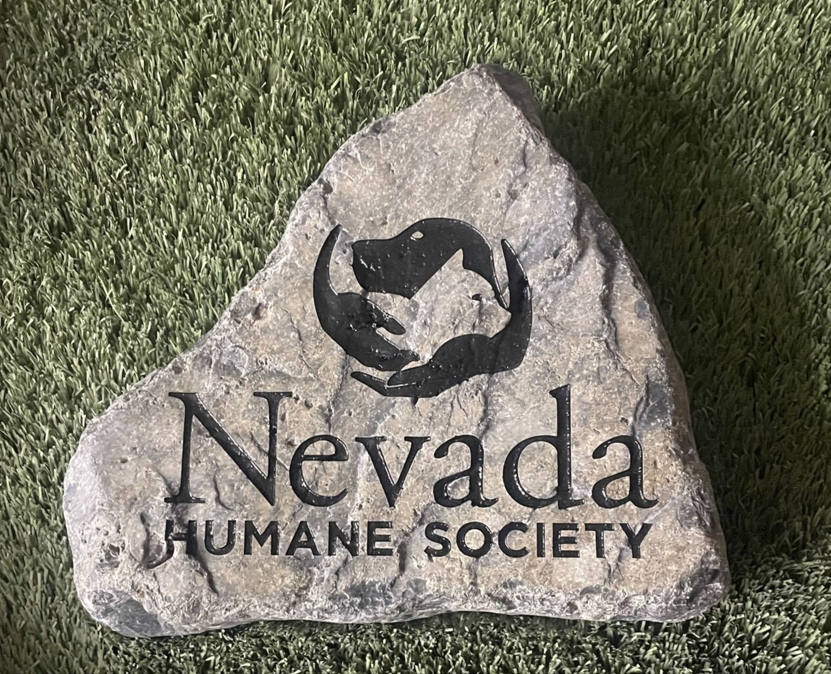 Nevada Humane Society engraved stone on grass