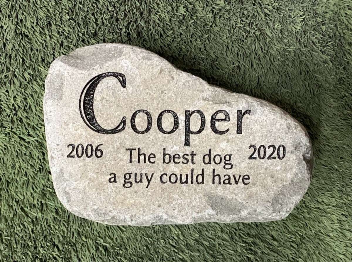 Pet memorial stone for Cooper, beloved dog.