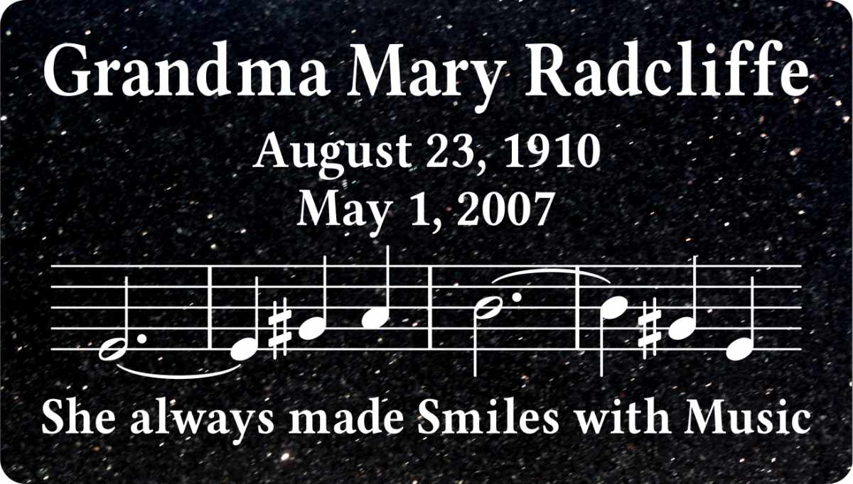 Memorial plaque with musical notes and tribute message.
